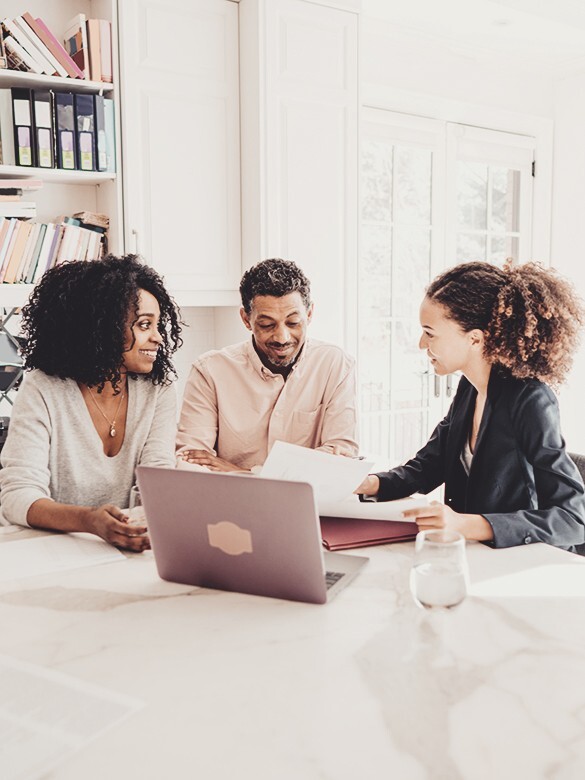 team interacting on a desk