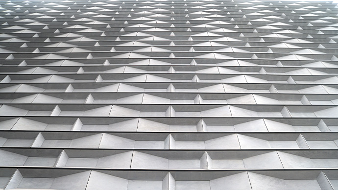 An outside wall of a modern building taken in Tsim Sha Tsui, Hong Kong.  
