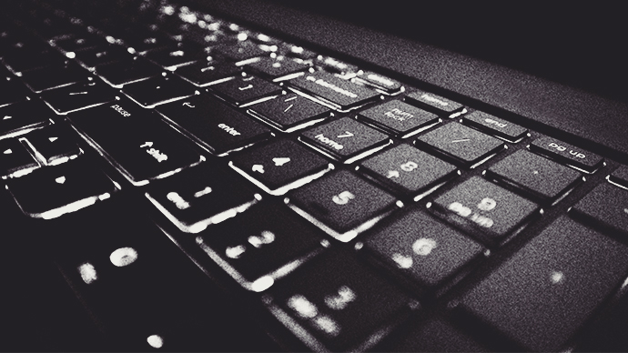 Backlit laptop keyboard up close