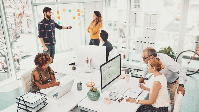 Employees collaborating in the office