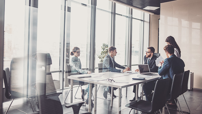 Corporate business team and manager in a meeting