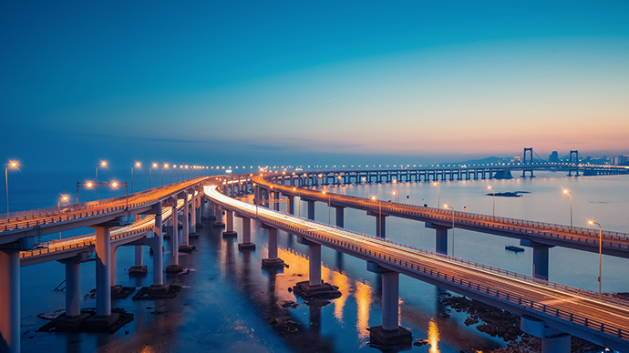 Beautiful bridge over water at sunset