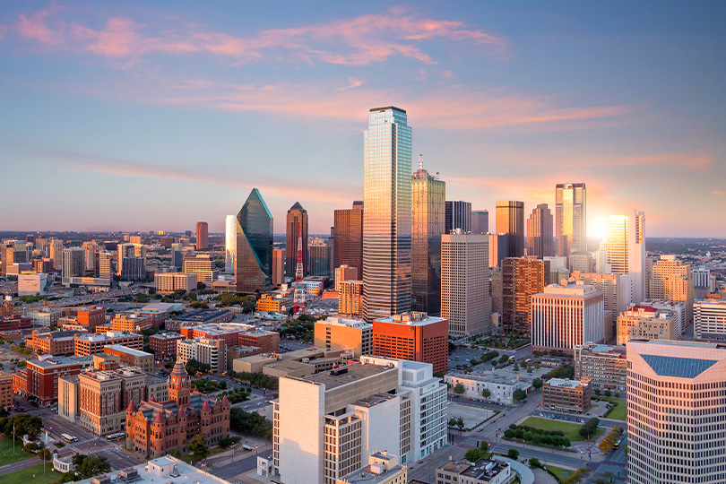 Dallas, Texas cityscape with blue sky at sunset