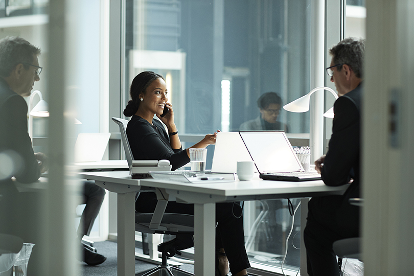 Businesswoman working in modern open office