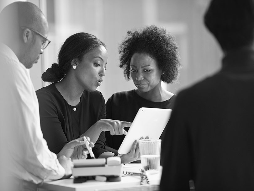 Preparing future leaders Business people working in high-end modern office