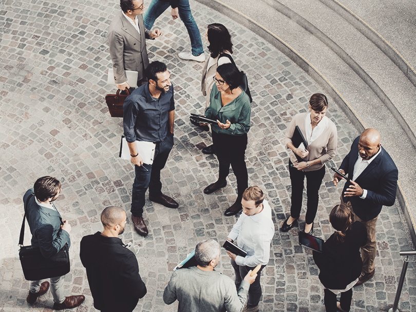 Professionals socializing outside