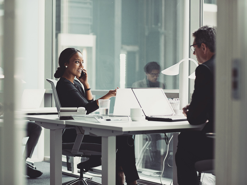 Businesswoman working in modern open office