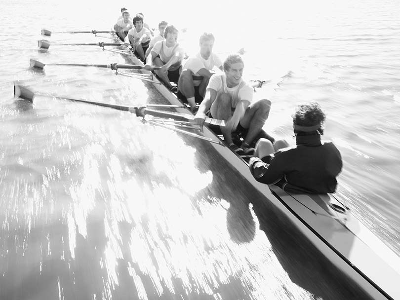 crew rowing on the water