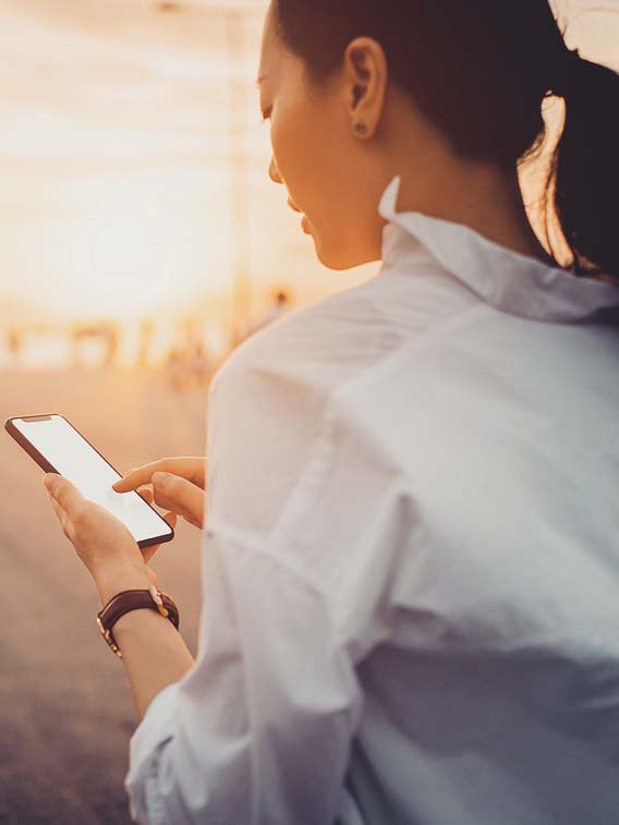 woman looking at phone